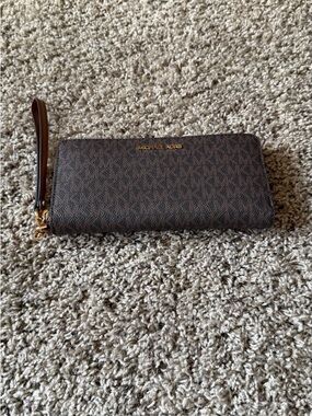 Michael Kors Brown Monogram Wristlet Clutch with Gold Logo
